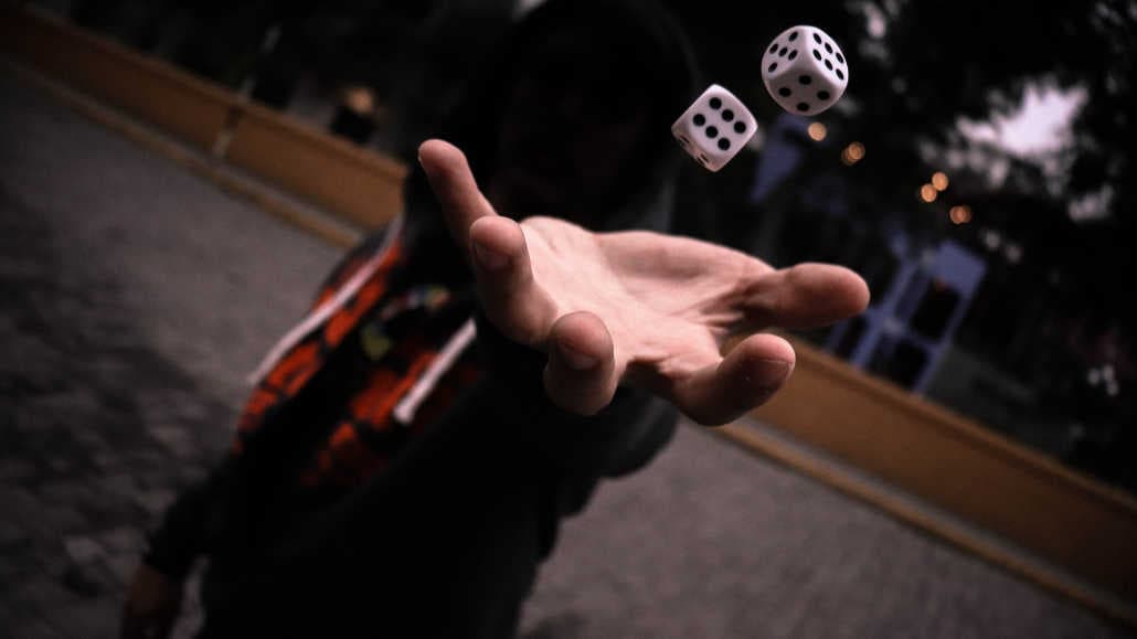 How to Play Sic Bo: Rules & Strategy for Beginners